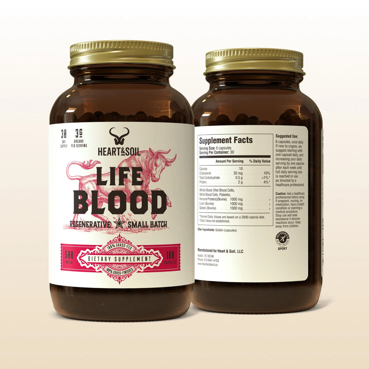 Two bottles of 'Life Blood' dietary supplement with visible labels on a beige background